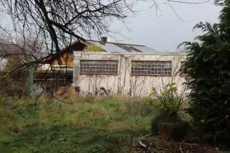 Einfamilienhaus mit Werkstatt und Garage