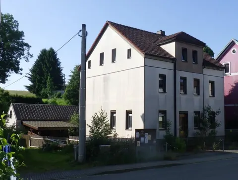 Sanierungsbedürftiges Wohn- und Geschäftshaus