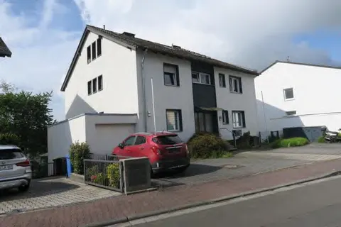 Mehrfamilienhaus mit Garage