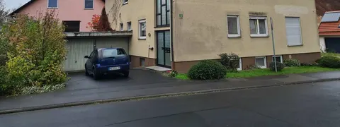 Mehrfamilienhaus mit Garage und Grundstück