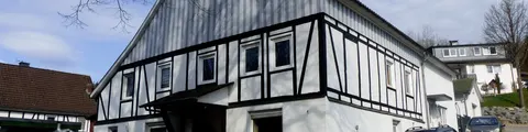 Eigentumswohnung in Doppelhaushälfte mit Garage