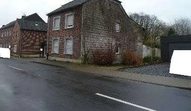 Einfamilienhaus mit Erweiterungsanbau und Garage