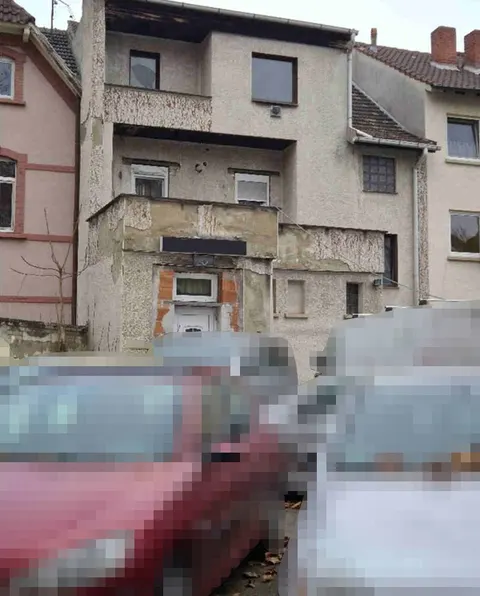 Sanierungsbedürftiges Wohn- und Geschäftshaus