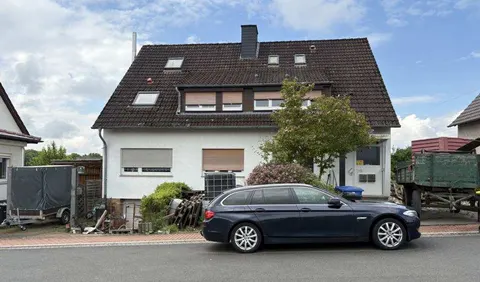 Einfamilienhaus mit Gartenhaus