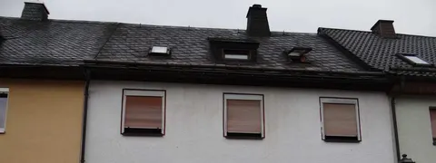 Sanierungsbedürftiges Reihenhaus mit Garage